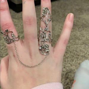 Multiple finger rose ring